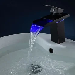 Brass Bathroom Sink Faucet,Waterfall Oil-rubbed Bronze Single Handle One Hole Water Flow LED Power Source Bath Taps with Zinc Alloy Handle Material, Ceramic Valve,and Cold/Hot Switch