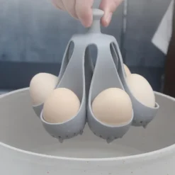 Egg Poachers - Silicone Egg Boiling Gadget, Hard Boiled Egg Holder, Egg Poaching Cups, Makes Hard or Soft Boiled Eggs, Kitchen Egg Storage Rack