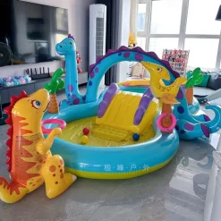 Inflatable Dinosaur Play Center Outdoor Playhouse Inflatable Water Park with Kid Pool Slide, Water Sprayer, Waterfall, and 6 Balls, Multicolor