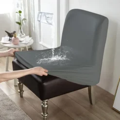 1Pc PU Waterproof Solid Color Stretch Armless Chair Cover - Durable PU Leather Slipcover for Single Oversized Chairs - Ideal for Home and Hotel Furniture Protection