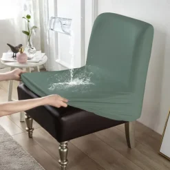 1Pc PU Waterproof Solid Color Stretch Armless Chair Cover - Durable PU Leather Slipcover for Single Oversized Chairs - Ideal for Home and Hotel Furniture Protection