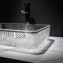 The modern light luxury transparent art rectangular die-cast glass wash basin with faucet sink