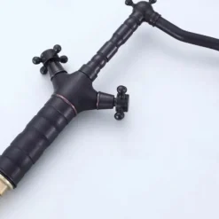 Traditional Brass Bathroom Sink Faucet,Black Oil-rubbed Bronze Deck Mounted Two Handles One Hole Bath Taps with Zinc Alloy Handle,Hot and Cold Switch and Ceramic Valve